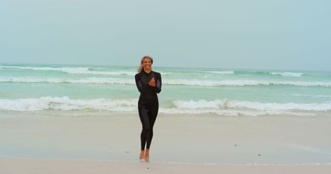 Senior Surfer Enjoying Surfside Run on Sandy Beach