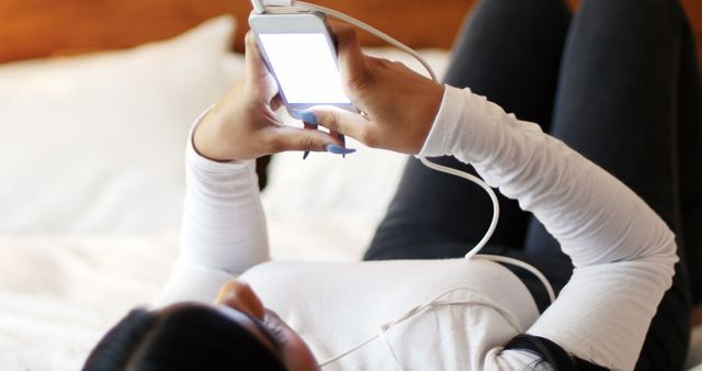 Woman Lying on Bed Using Smartphone - Download Free Stock Images Pikwizard.com