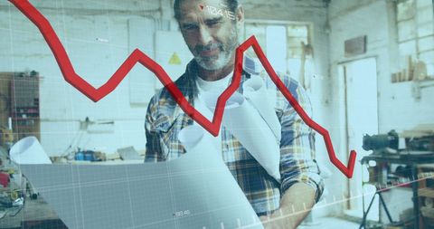 Distressed Carpenter Analyzing Market Downtrend in Workshop