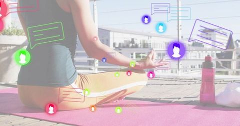 Urban rooftop meditation practicing mindfulness on pink yoga mat with social chat overlay