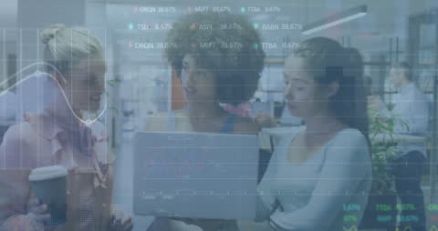 Diverse Women Collaborating on Financial Strategy with Digital Connectivity