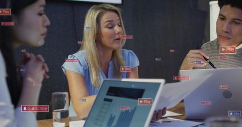 Collaborative Office Meeting with Digital Notifications Overlay