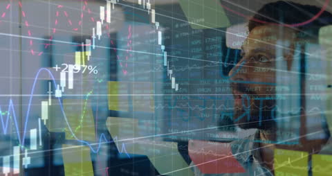 Businessman Analyzing Stock Market Data with Graphs