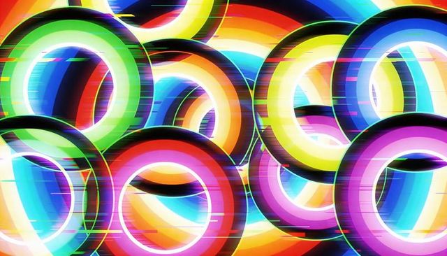 Glowing overlapping neon rings pulsing on dark digital backdrop with chromatic scanlines