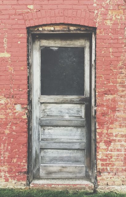 Aged Wooden Door in Red Brick Wall - Download Free Stock Photos Pikwizard.com