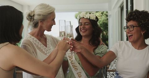Bride-To-Be Toasting with Friends on Wedding Day Celebration