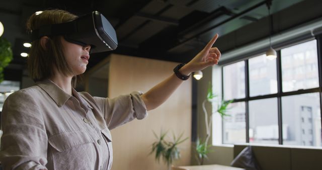 Woman Exploring Virtual Reality with VR Headset - Download Free Stock Images Pikwizard.com