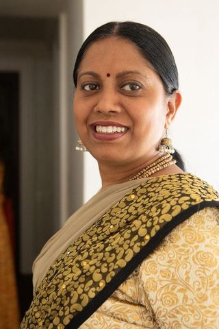 Elegant indian woman wearing traditional saree and accessories