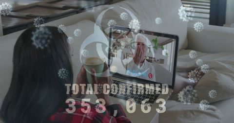 Woman video calling during covid-19 pandemic with case updates overlay