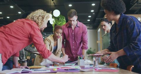 Creative Team Brainstorming in Modern Open-Plan Office