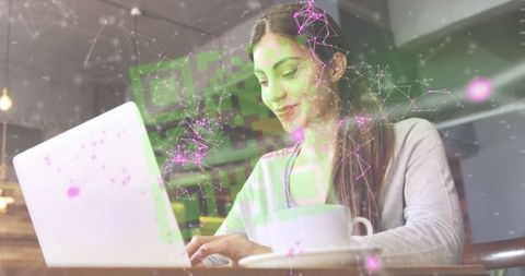 Technologically Connected Woman Typing on Laptop in Coffee Shop