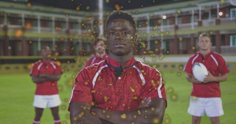 Confident rugby captain posing with teammates under stadium floodlights with golden bokeh
