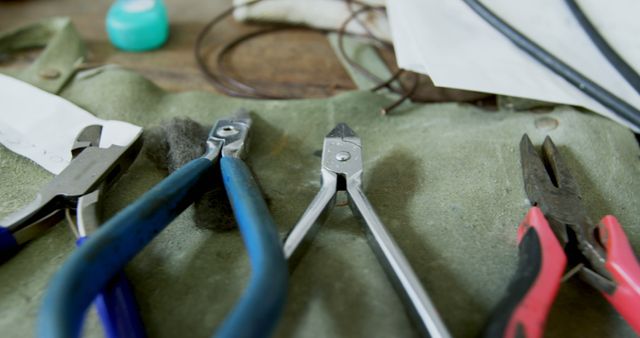 Close-Up of Various Pliers and Tools on Workbench - Download Free Stock Images Pikwizard.com