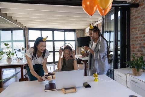 Diverse Colleagues Celebrating Office Birthday with Joy and Festivity