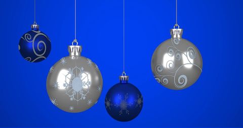 Elegant Christmas Baubles on Vibrant Blue Background