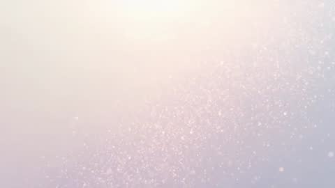 Looping pastel particle field drifting diagonally with warm glow, bokeh and glitter sparkle