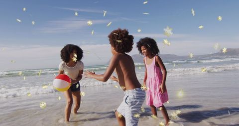 Joyful Christmas Celebration on Beach with African American Children