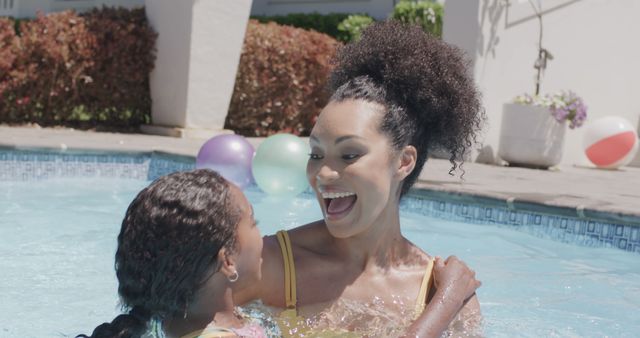 Mother and Daughter Playing Together in Swimming Pool on Sunny Day - Download Free Stock Images Pikwizard.com