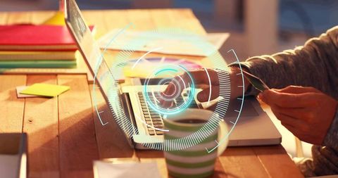 Contactless Online Payment on Laptop with Futuristic HUD and Sunlit Wooden Desk
