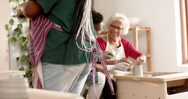 Senior Woman and Youth Having Fun with Pottery Together - Download Free Stock Images Pikwizard.com