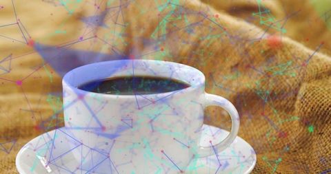 Rustic ceramic coffee cup on burlap blending cozy warmth with digital network overlay