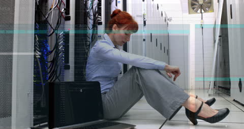 Stressed IT Engineer Among Data Servers and Overlapping Code