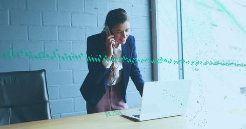 Businesswoman Analyzing Financial Data on New Development