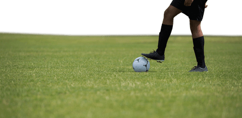 Transparent Soccer Player Standing with Ball on Grass Field