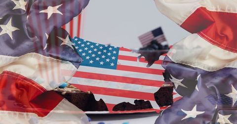 American flag cutout with patriotic food and decor