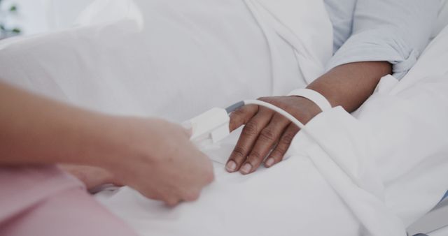 Closeup of Patient's Hand with Pulse Oximeter in Hospital Bed - Download Free Stock Images Pikwizard.com