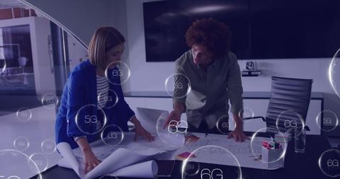 Colleagues Collaborating in Modern Office with 6G Technology