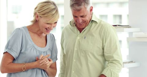 Caucasian Couple Enjoying Happy Moment in Casual Home Environment