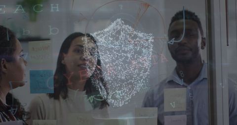 diverse team analyzing cybersecurity data in modern office - Download Free Stock Images Pikwizard.com