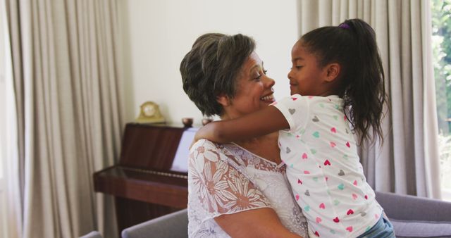 Grandmother Enjoying Quality Time with Granddaughter at Home - Download Free Stock Images Pikwizard.com