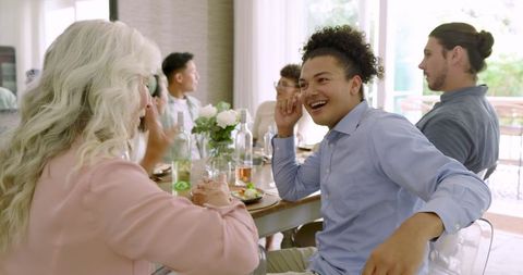 Guests engaging in lively conversation at an elegant reception