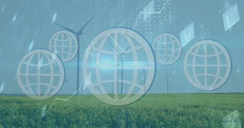 Digital globe icons on green field with wind turbines