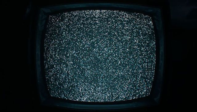 CRT Television Screen with Obsolete Static Noise in Monochrome