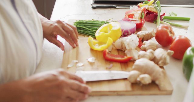 Hands Chopping Fresh Vegetables on Cutting Board - Download Free Stock Images Pikwizard.com