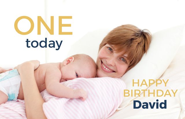This image captures a heartwarming moment between a mother and her infant on the baby's first birthday, perfect for family-oriented advertisements, parenting blogs, baby product promotions, or greeting card designs.