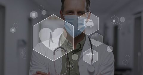 Doctor in Mask with Medical Icons Overlay in Hospital Environment - Download Free Stock Images Pikwizard.com