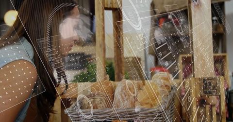 Woman Examining Bread with Futuristic Augmented Reality Overlay