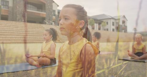 Schoolgirls Practicing Outdoor Yoga with Nature Overlay
