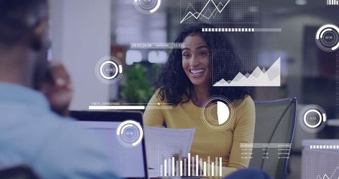 Professional Woman Using Data Analytics in Collaborative Meeting