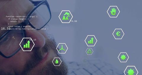 Bearded Professional Analyzing Data and Environmental Icons in Modern Setting