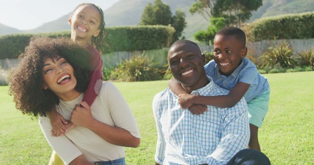 Happy African American Family Enjoying Outdoors in Sunny Park - Download Free Stock Images Pikwizard.com