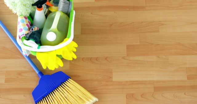 Cleaning Supplies on Wooden Floor with Broom and Bucket - Download Free Stock Images Pikwizard.com