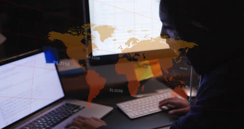 Overlay of World Map on Businesswoman Using Computers
