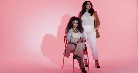 Elegant Female Models Posing in Minimalistic Studio