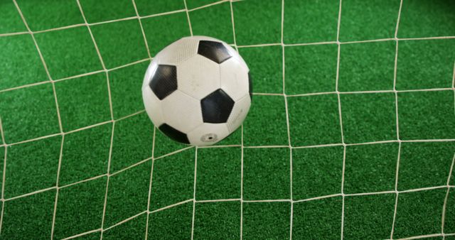 Close-up of football inside goalpost 4k