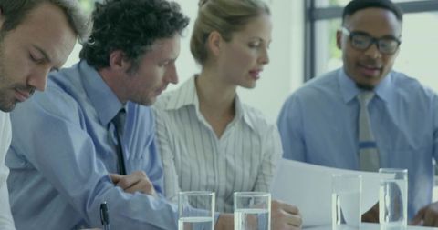 Diverse Business Team in Productive Meeting at Modern Conference Room